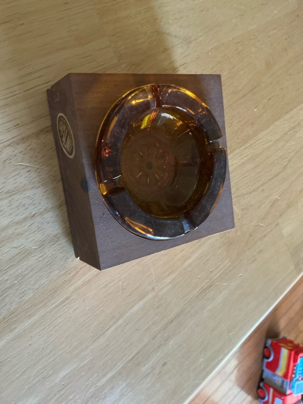 Amber Glass Decorative Accent with Dark Wood Base